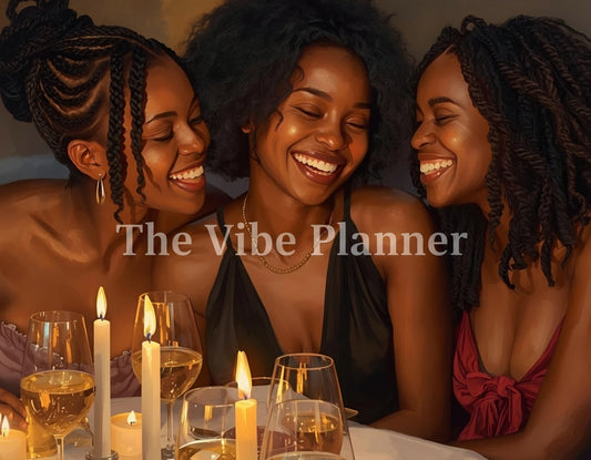 Three women laughing together at a dinner table with candles and wine glasses.